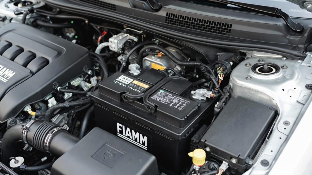 FIAMM 12V 60Ah battery in a compact sedan engine bay”